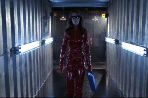 Either Lois Lane looks properly dressed for being in The Matrix, or she's going to her part-time job as Mistress Lane.  I don't have enough cash for her to inflict pain on me.